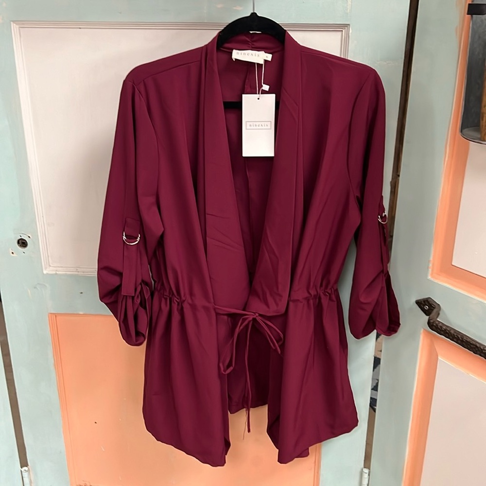 Women’s wine colored grab and go jacket